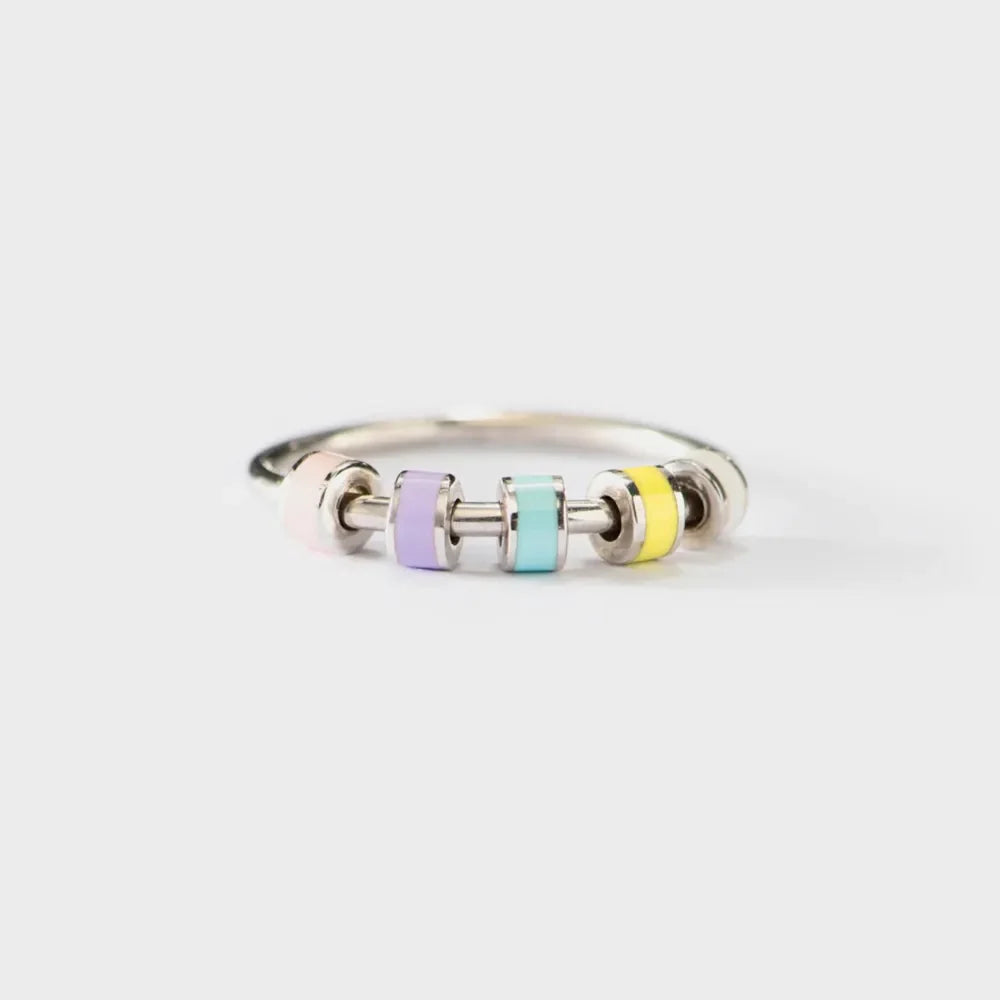 Sterling silver oil drip ring by Shopimist featuring a smooth, polished design and intricate textured details on the band.