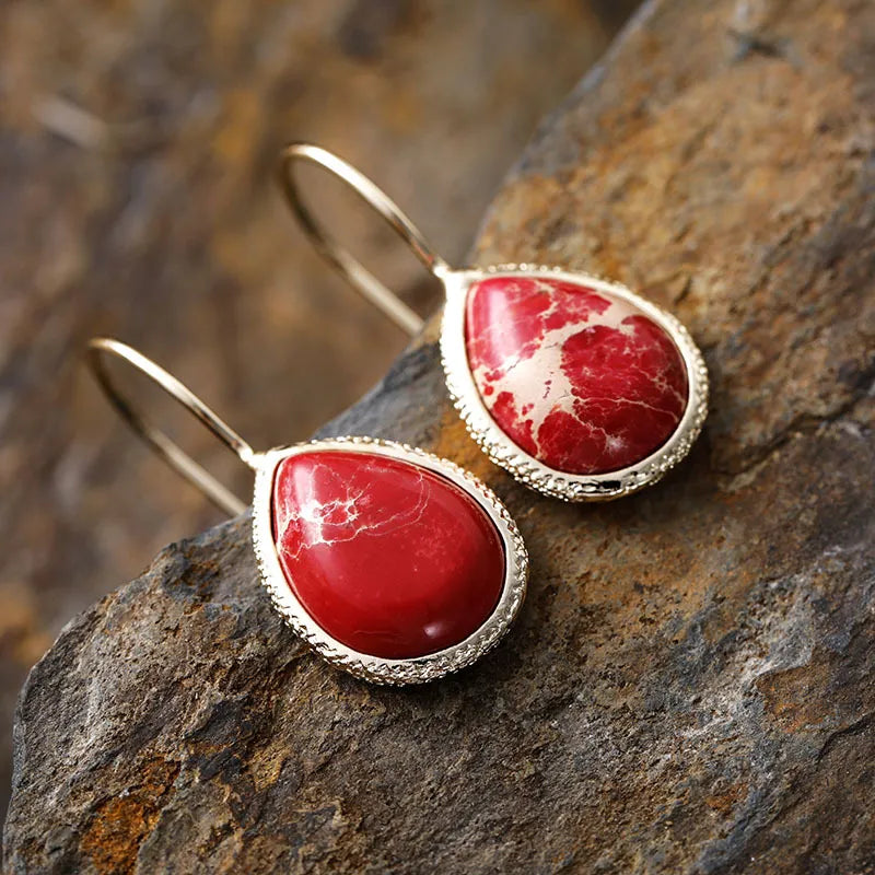 Copper natural stone teardrop earrings with a polished finish, featuring elegant teardrop shapes and earthy tones.