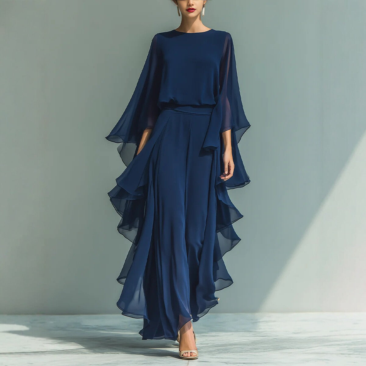 Deep blue ruffle wide-leg pants set by FitiqueFit featuring batwing sleeves, elegant two-piece outfit for women, front view.