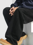 Men's loose fit pocket pants by Trendsi, comfortable plus size casual trousers, shown in a relaxed fit with side pockets.