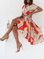 Printed button front midi dress with belt from Shopimist, featuring a floral pattern and a waist tie for a stylish look.