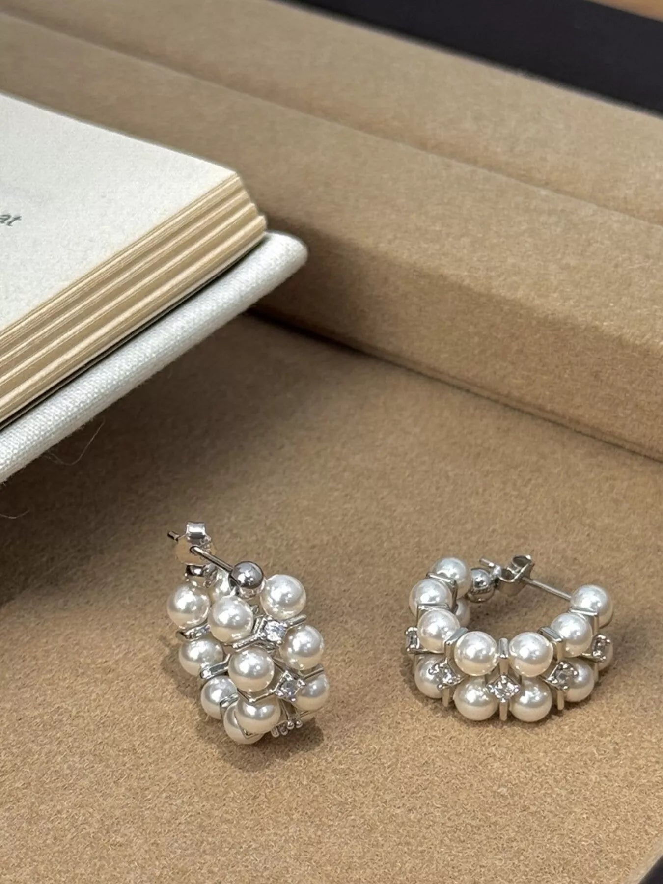 Pearl hoop earrings by Plush Fashion Hub featuring elegant white pearls and gold-tone hoops for a stylish look.