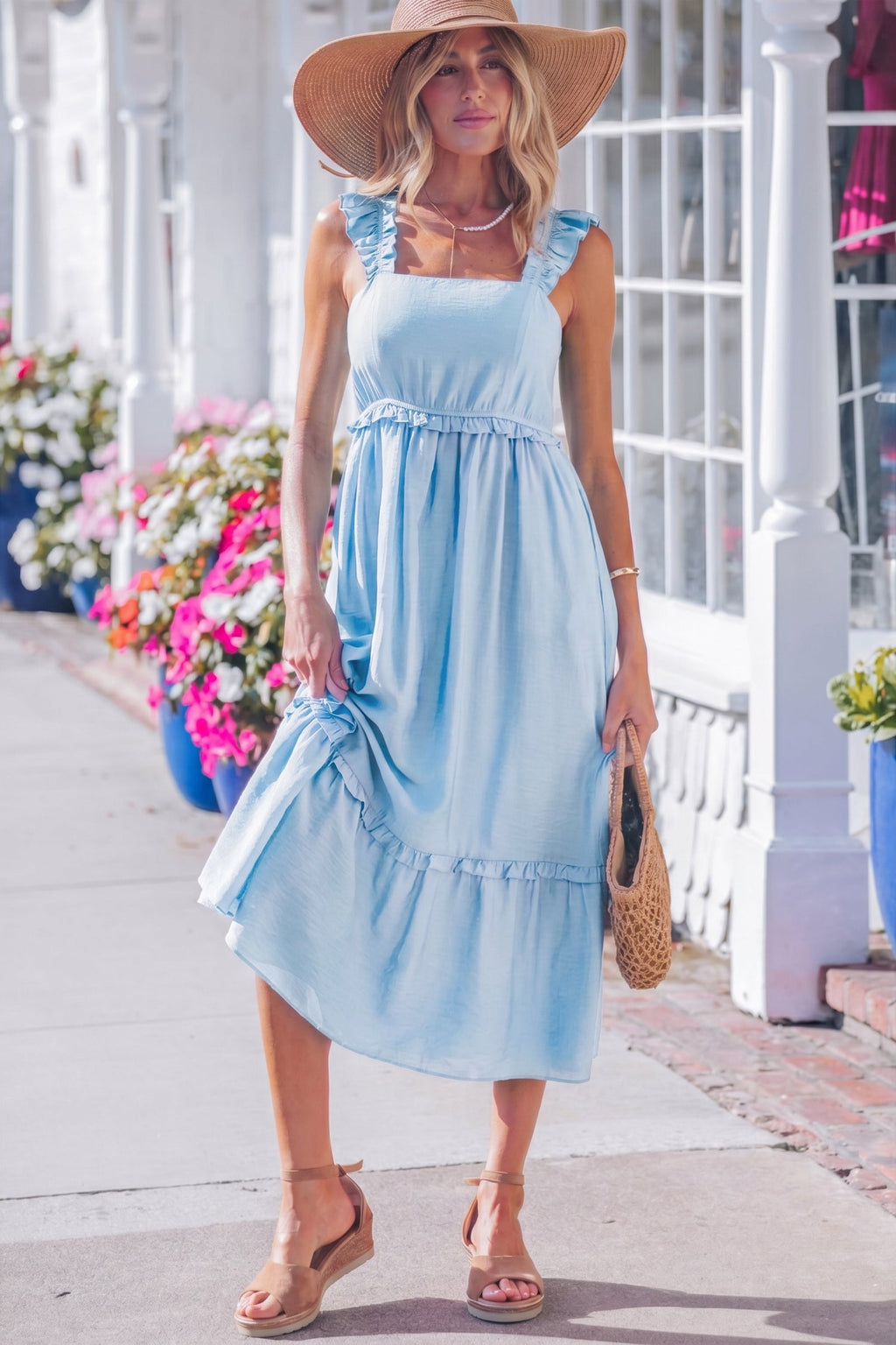 Sleeveless Emily waist maxi dress by Threaded Pear featuring a flowing design and elegant silhouette.