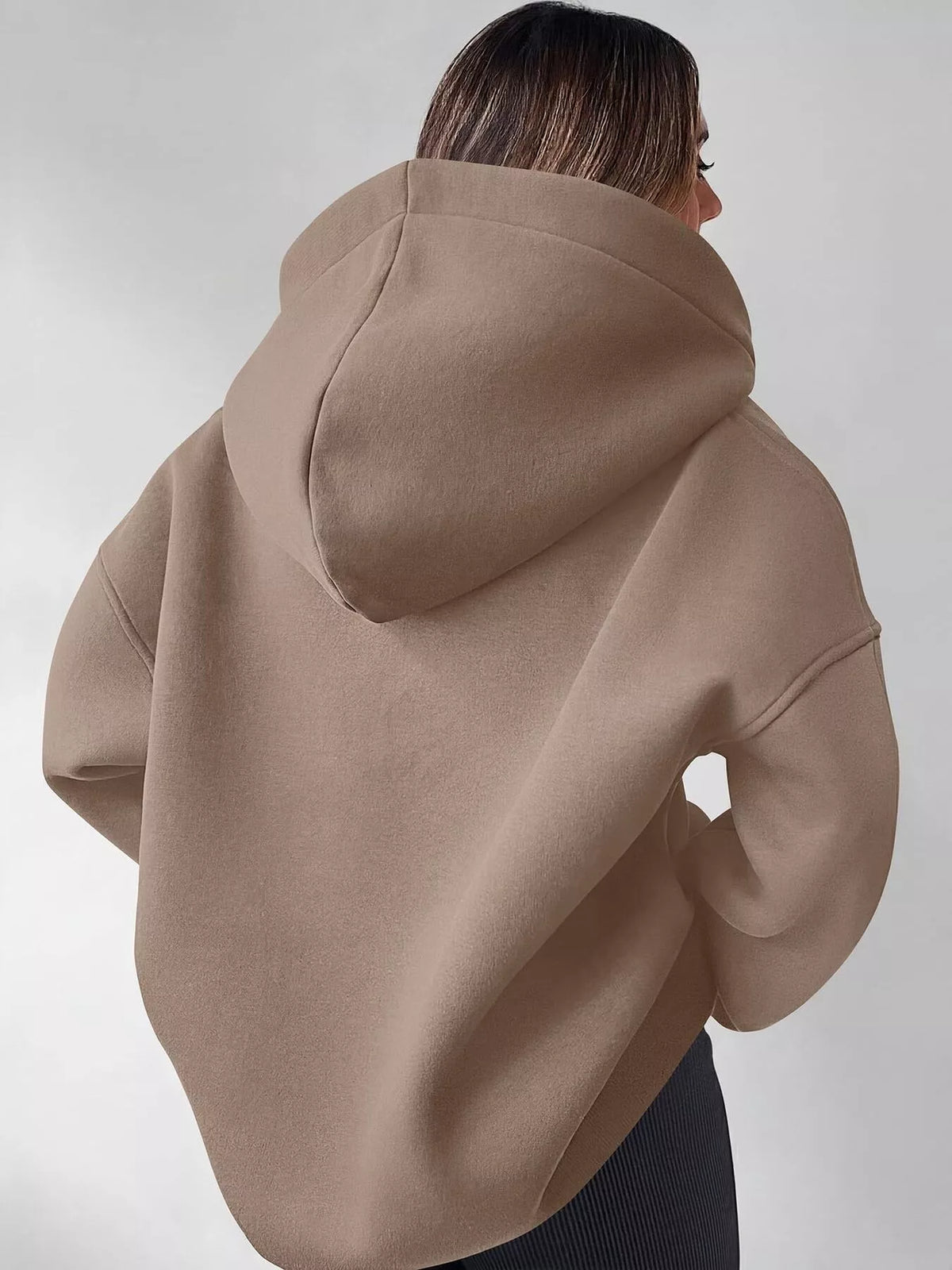 Gray oversized quarter-zip hoodie from Trendsi featuring a relaxed fit and soft fabric, perfect for casual wear.
