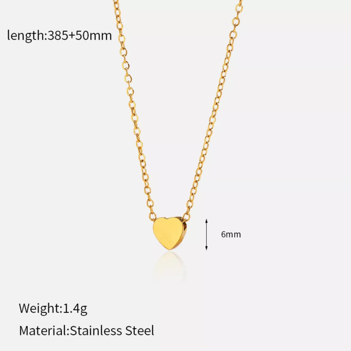 18K gold-plated heart pendant necklace with delicate chain, showcasing a shiny, elegant jewelry piece from Shopimist.