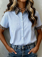 Women's leopard print short sleeve dress with contrast collar by Plush Fashion Hub, featuring stylish animal print and modern design.