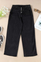 High-waisted button-fly wide-leg jeans from Trendsi featuring classic denim fabric and relaxed fit, displayed on a hanger.