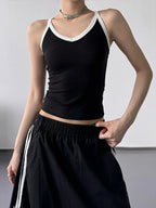 Contrast trim cami top from Trendsi featuring a sleek design with contrasting edging, perfect for stylish casual wear.