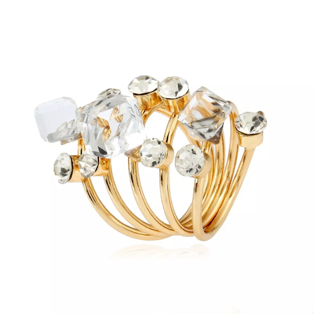 18K gold-plated multi-layered ring with intricate design and shiny finish, showcasing layered band styles and detailed craftsmanship.