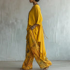 FitiqueFit solid color sleeveless top and wide-leg pants two-piece set, featuring a stylish sleeveless top and flowy wide-leg pants.