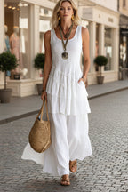 Women's cotton linen sleeveless loose maxi dress by FitiqueFit, casualwear with flowing fabric and relaxed fit, shown on a model.
