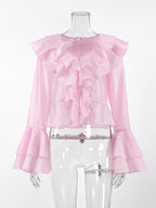 Women's elegant long sleeve blouse with ruffle trim, made from soft Tencel blend, stylish and comfortable top by Trendsi.