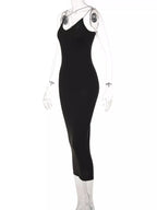 Shopimist leopard print spaghetti strap midi dress with fitted bodice and flowing skirt, perfect for stylish summer wear.