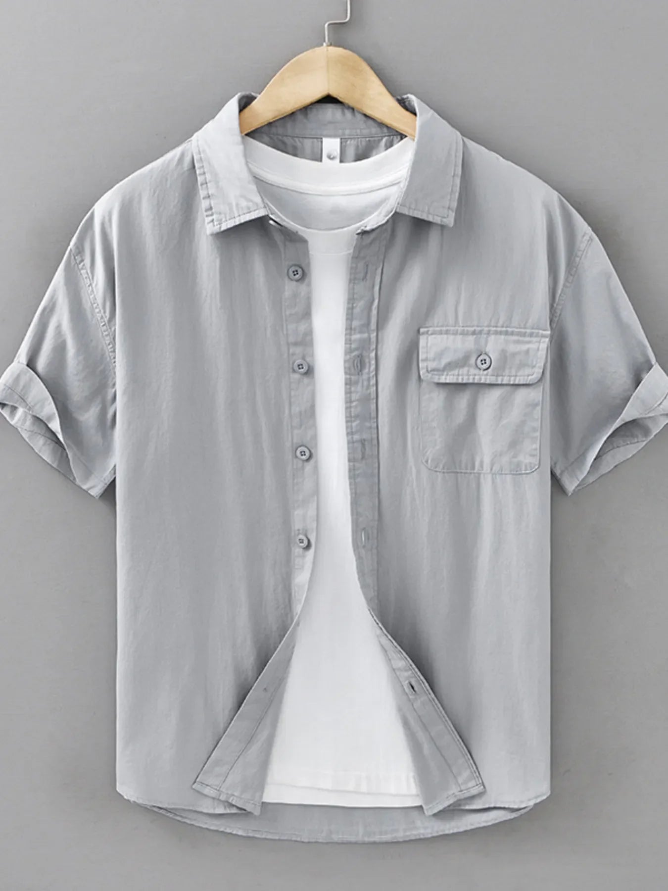 Men's plus size short sleeve button-up shirt by Shopimist, featuring a casual fit and classic collar, shown on a model.