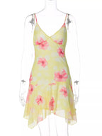 Sheer floral print sleeveless asymmetrical mini dress by Shopimist, featuring a lightweight fabric and stylish design.