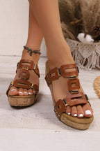 Sara Leather Wedge Platform Slippers by Threaded Pear featuring black leather straps and chunky wedge soles.