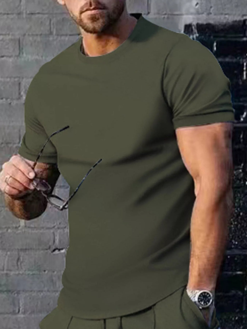 Men's plus size casual T-shirt in solid color by Trendsi, featuring a comfortable fit and simple design, perfect for everyday wear.