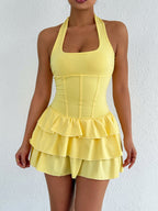 Halter neck ruffle layered dress by Plush Fashion Hub featuring a flowy silhouette and stylish ruffle details.