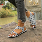 Shopimist toe loop flats sandals with stylish straps and a comfortable flat sole, perfect for casual wear.