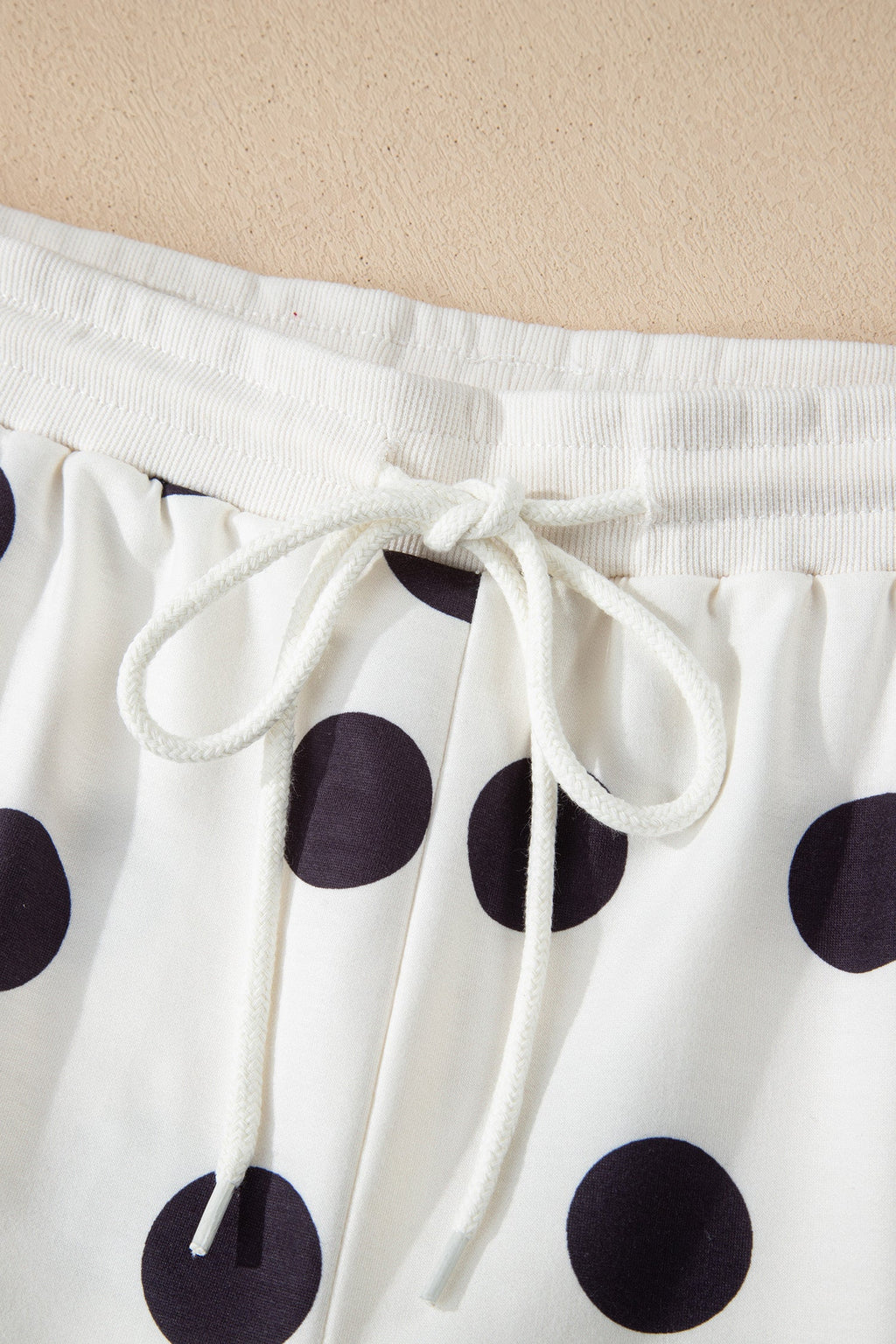Threaded Pear Marley shoulder pullover and drawstring shorts set, casual loungewear in soft fabric with relaxed fit and stylish design.