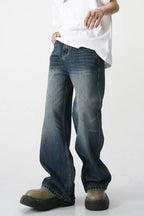 Plush Fashion Shop denim bootcut jeans with front pockets, classic fit, and stylish design, displayed on a neutral background.
