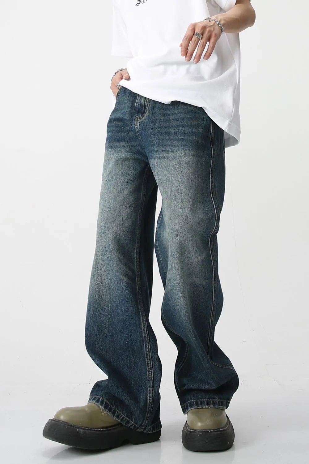 Plush Fashion Shop denim bootcut jeans with front pockets, classic fit, and stylish design, displayed on a neutral background.