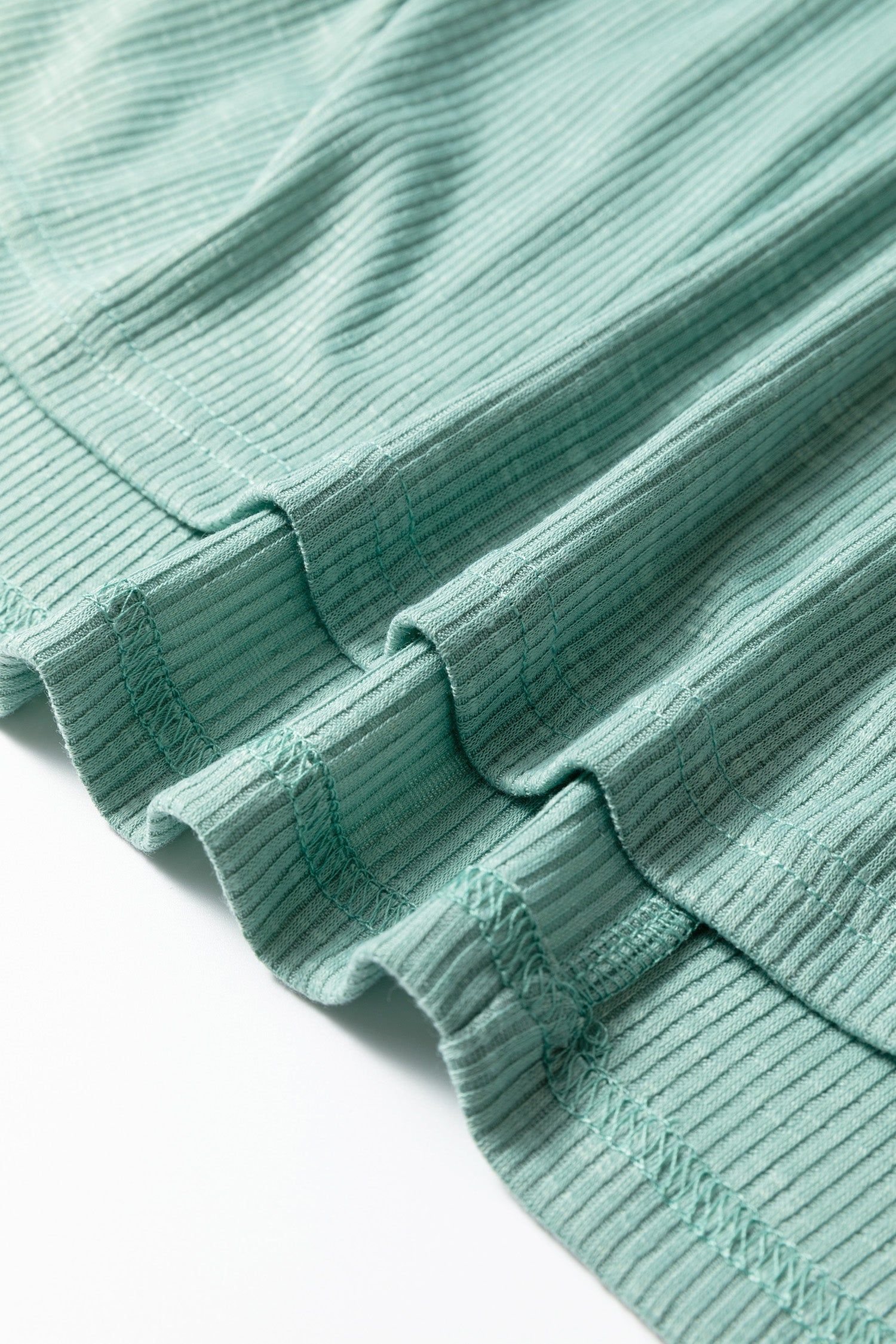 Plus size Mazie Mist Ribbed Patchwork Tee by Threaded Pear, featuring ribbed fabric and colorful patchwork design.
