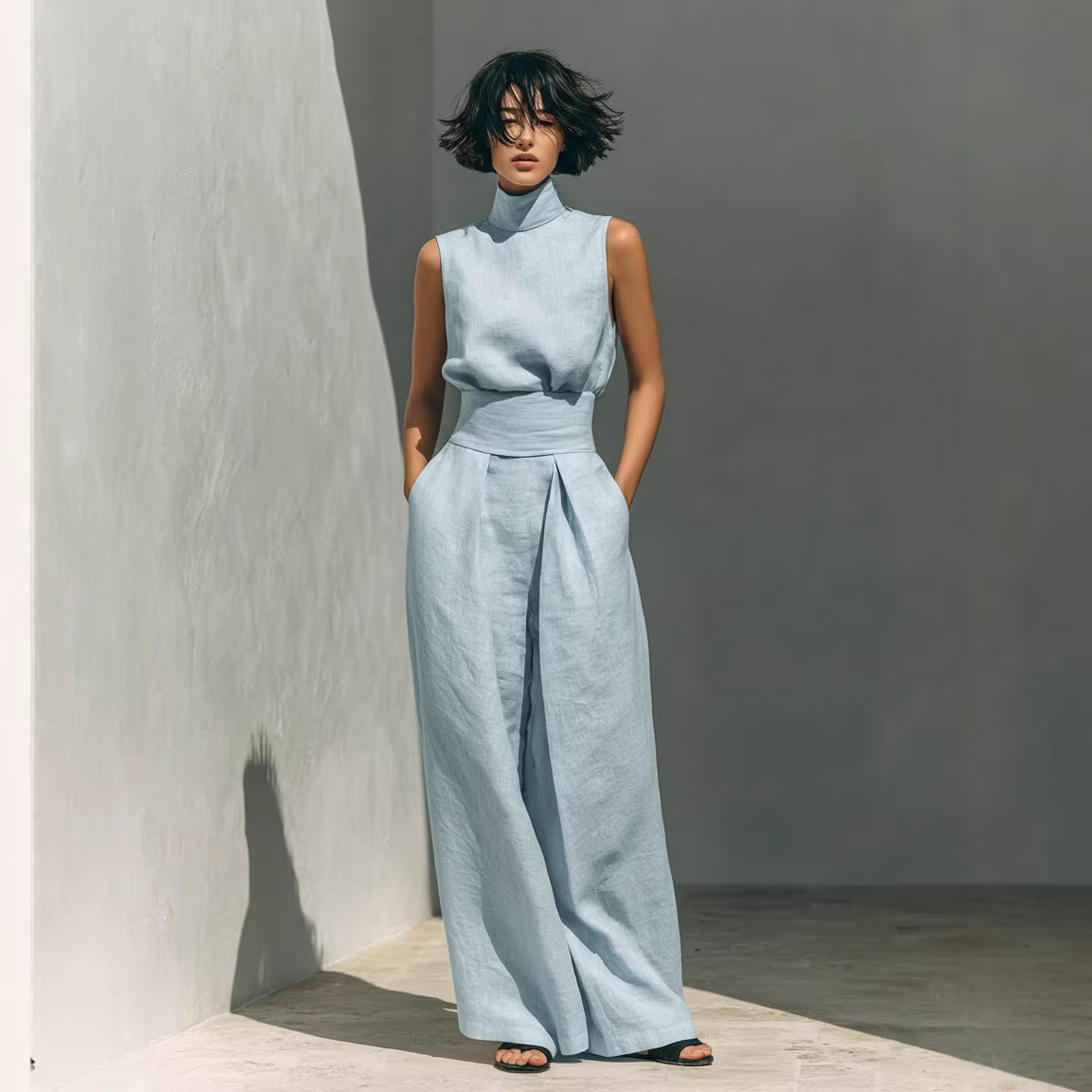 Women’s casual two-piece set by FitiqueFit featuring a sleeveless top and wide-leg pants, perfect for relaxed, stylish looks.