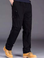 Men's plus size casual cargo pants by Trendsi, featuring multiple pockets and relaxed fit in lightweight fabric.