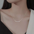 Sterling silver chain necklace from Shopimist with a sleek, polished design, featuring a delicate link chain on a plain background.