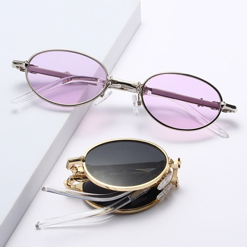 Light-tinted foldable small frame sunglasses for women by FitiqueFit, showcasing sleek, luxury eyewear design with compact style.