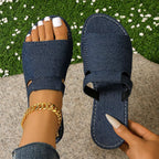 Open toe flats sandals by Shopimist featuring a sleek design with a comfortable sole and stylish open toe style.