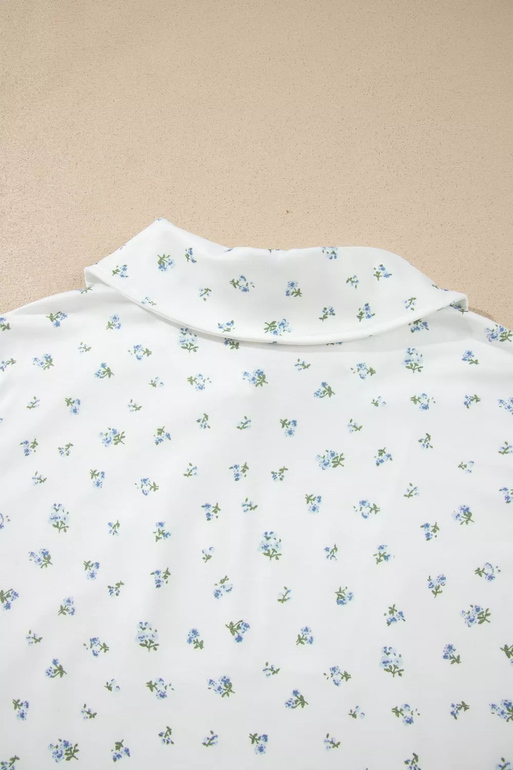 Floral print half zip top and matching shorts from Shopimist, casual summer set with vibrant flower pattern.