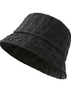 Women's lightweight textured summer bucket hat by Trendsi, breathable casual sun hat with wide brim for sun protection.