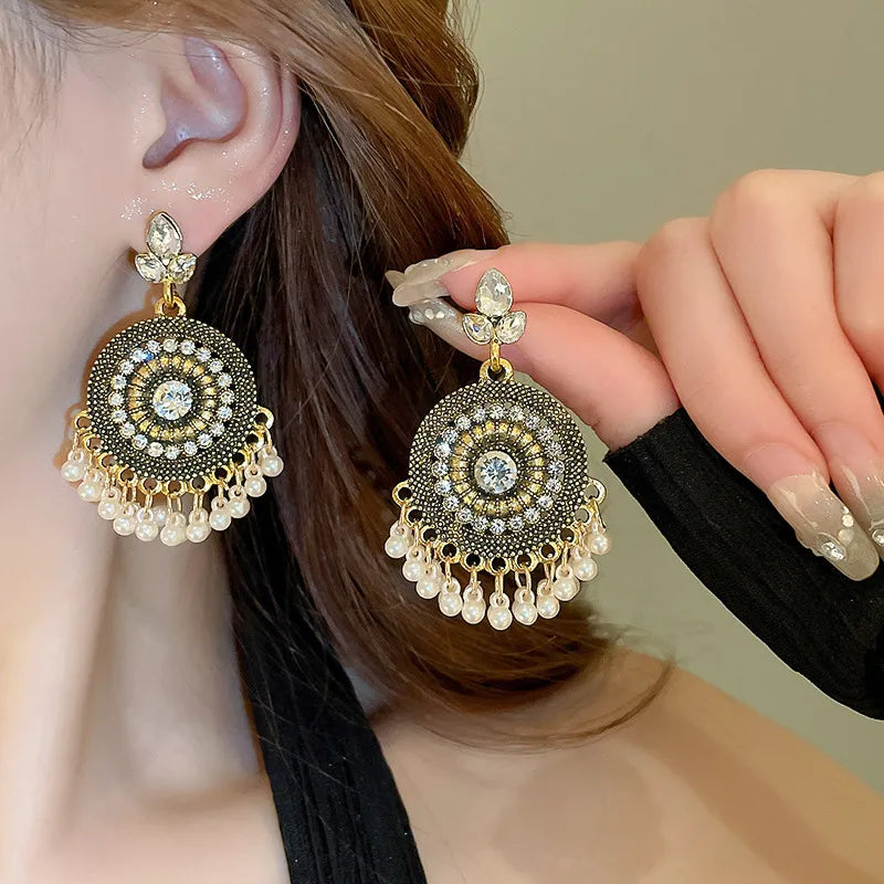 Rhinestone alloy bead dangle earrings with sparkling stones and gold-tone finish from Plush Fashion Hub, perfect for stylish accessories.