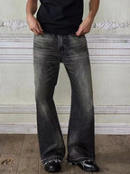 Men's vintage washed frayed hem denim jeans by Plush Fashion Hub, showcasing distressed details and relaxed fit.