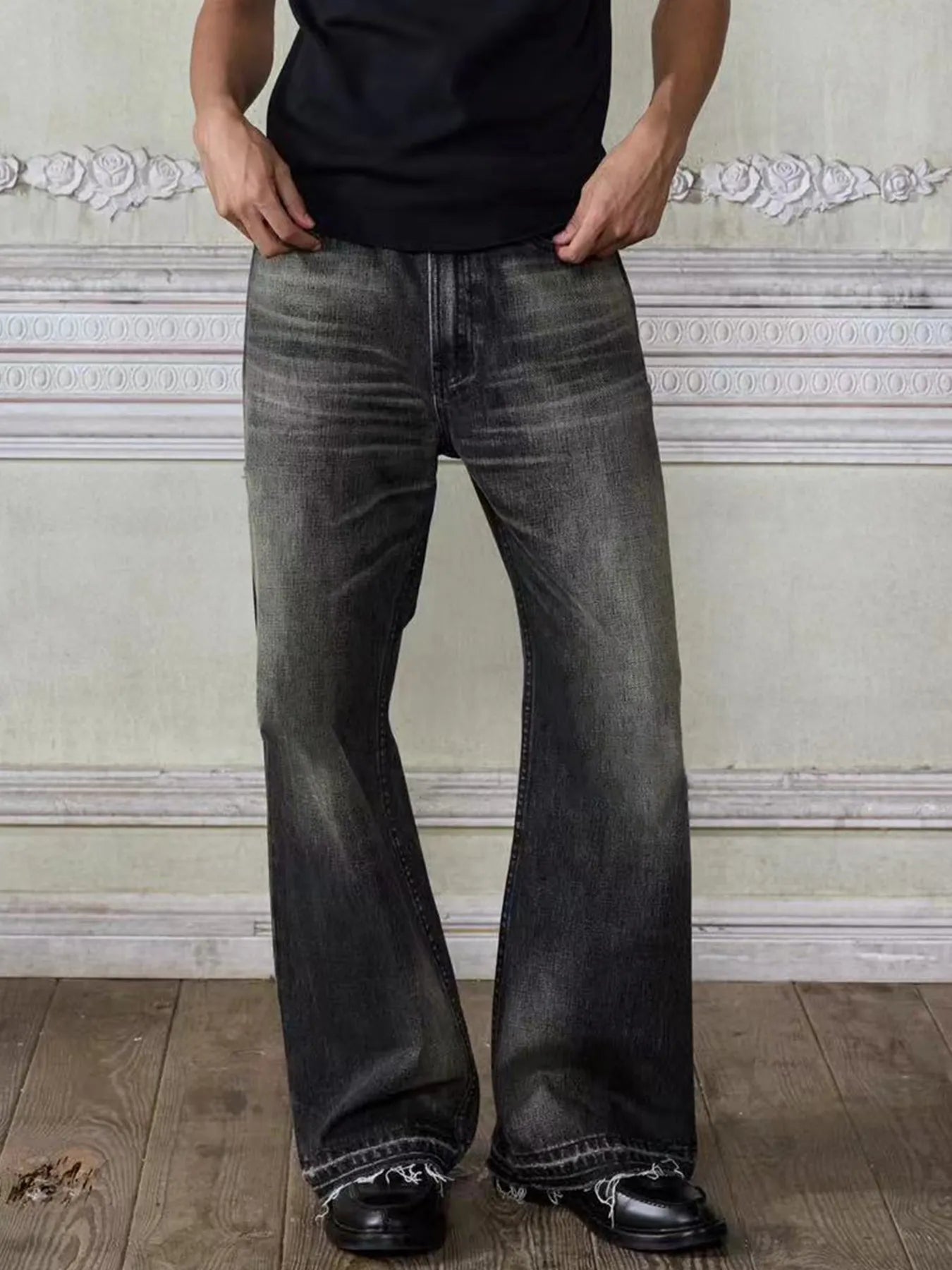 Men's vintage washed frayed hem denim jeans by Plush Fashion Hub, showcasing distressed details and relaxed fit.