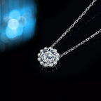 Sterling silver flower necklace with a 1 carat moissanite gemstone, delicate and elegant jewelry accessory.