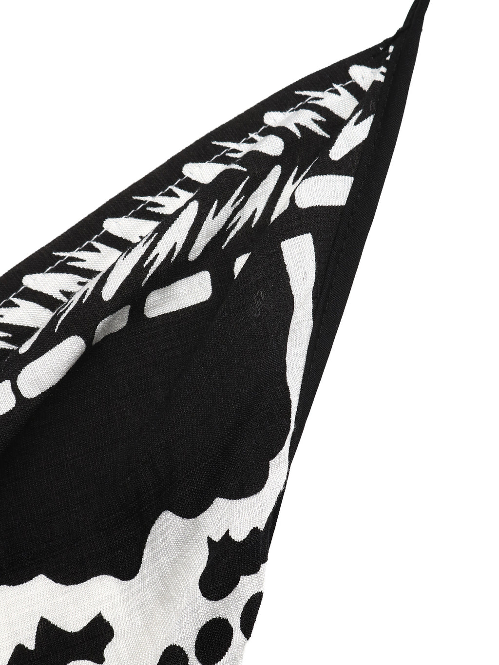 Women's printed halter neck maxi dress with tie-back detail from Plush Fashion Hub, flowing fabric and vibrant pattern.
