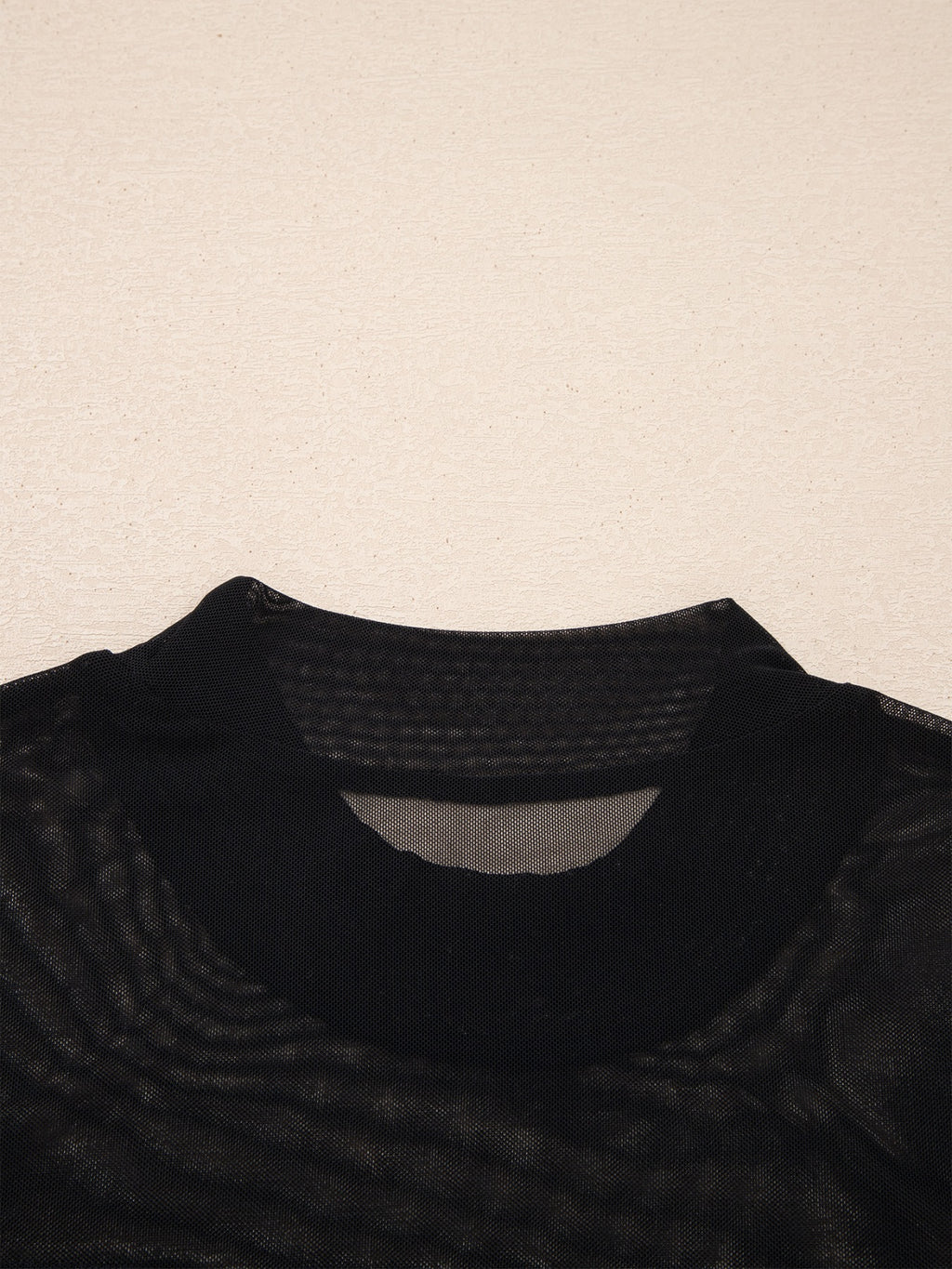 Women's sheer mesh patchwork cap sleeve T-shirt by Plush Fashion Hub, showcasing elegant layered design and intricate fabric details.
