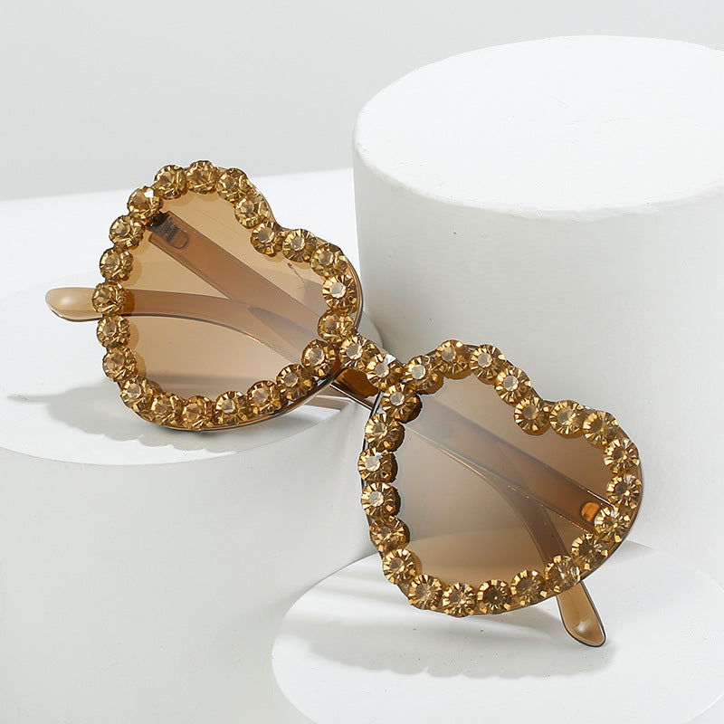 Peach heart-shaped rhinestone sunglasses from Plush Fashion Hub featuring Y2K INS style eye wear.