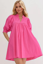 Women's cotton babydoll mini dress with notched puff sleeves and pockets, stylish and comfortable Trendsi dress.