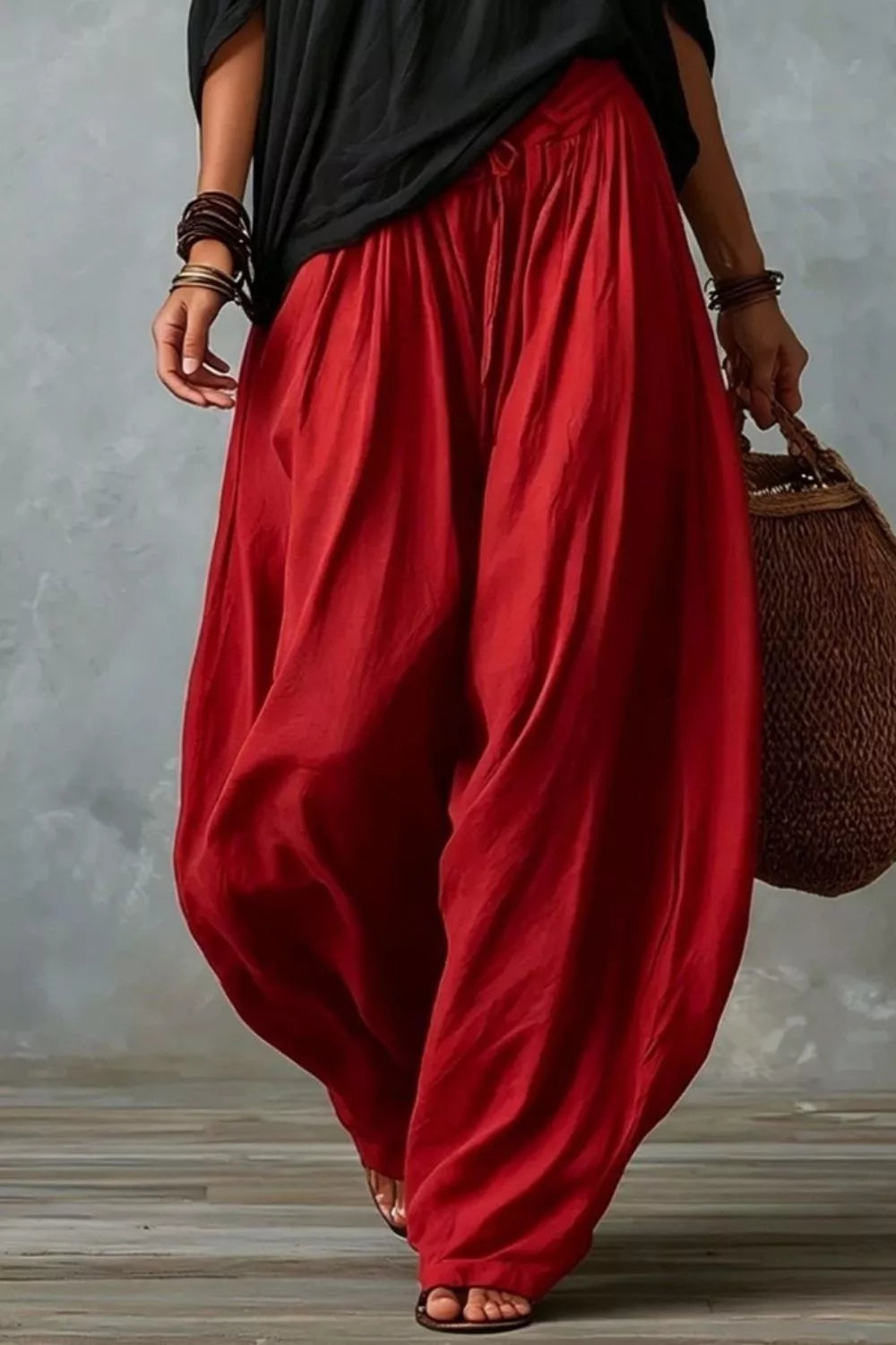 Plus size off-shoulder top and wide-leg pants set by Trendsi, featuring a stylish, comfortable matching outfit for women.
