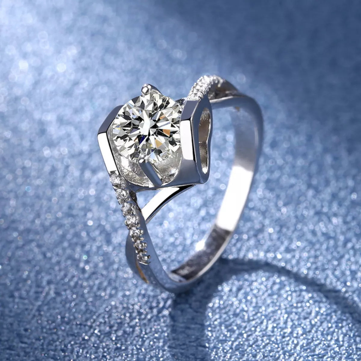 Sterling silver moissanite ring with 1-carat center stone, showcasing a sparkling, elegant design.