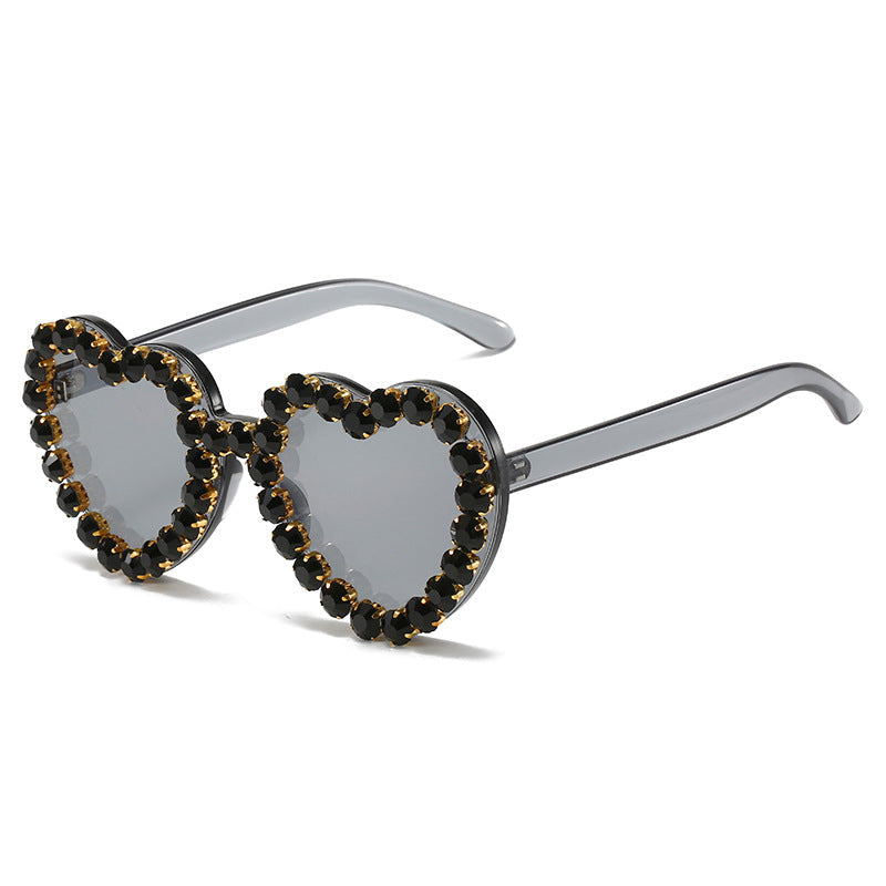 Peach heart-shaped rhinestone sunglasses in Y2K INS style, trendy eyewear from Plush Fashion Hub.