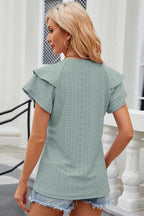 Eyelet notched flutter sleeve T-shirt from Trendsi, featuring lightweight fabric, flutter sleeves, and eyelet details.