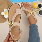 Shopimist toe loop flats sandals with minimalist design, featuring sleek straps and comfortable flat soles.