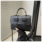 Stylish small square LadyShow.Store crossbody bag with versatile design and underarm carry style, shown in black with gold accents.
