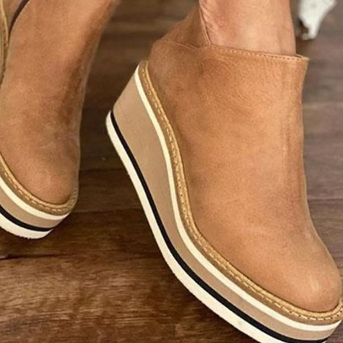 Women's ankle wedge boots with zipper, Trendsi brand, featuring a stylish design and comfortable wedge heel.