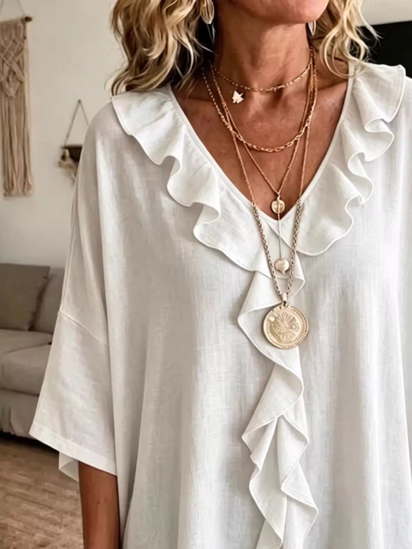 Plus size full ruffle V-neck blouse with 3/4 sleeves by Plush Fashion Hub, featuring a flattering fit and feminine ruffle details.